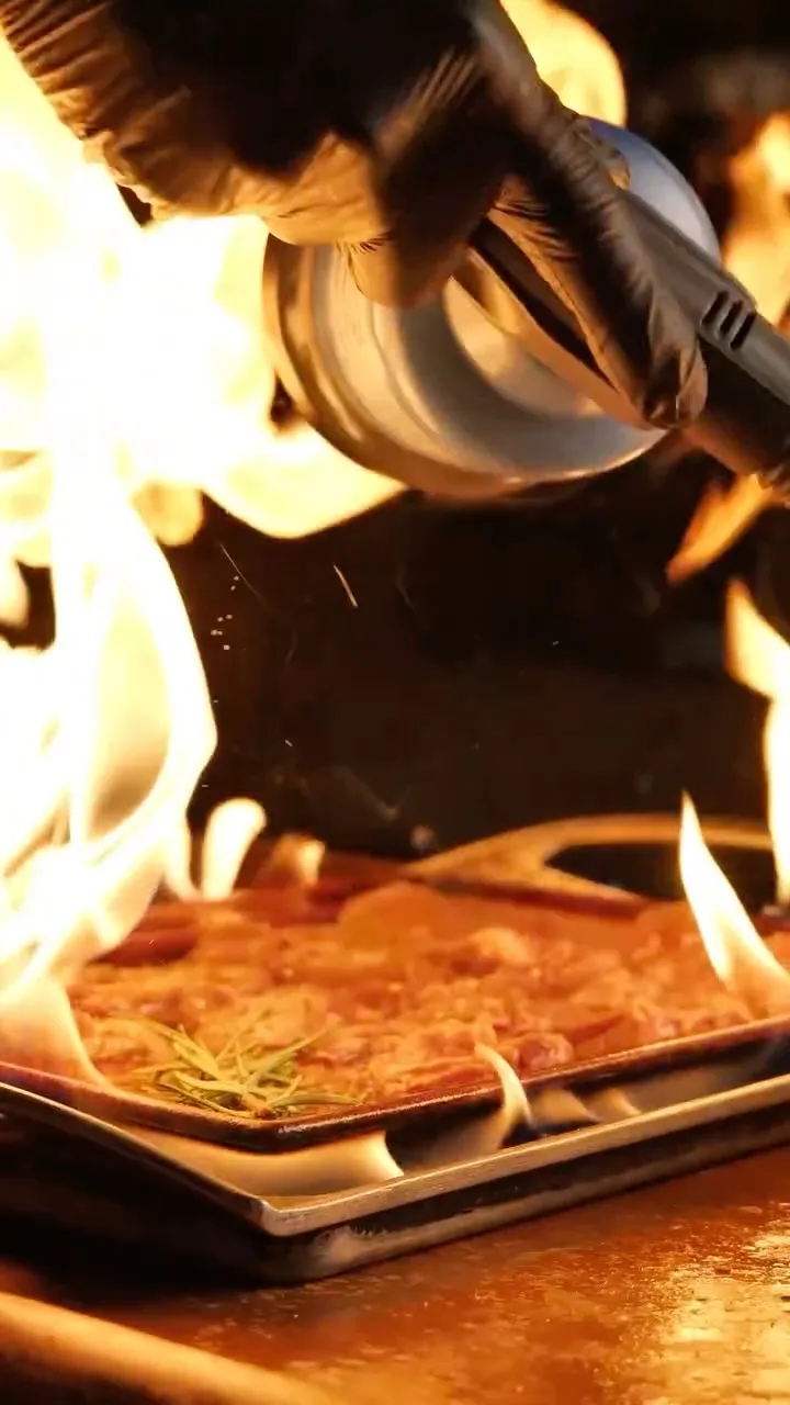 Cuisson flambée chez Gold Beef